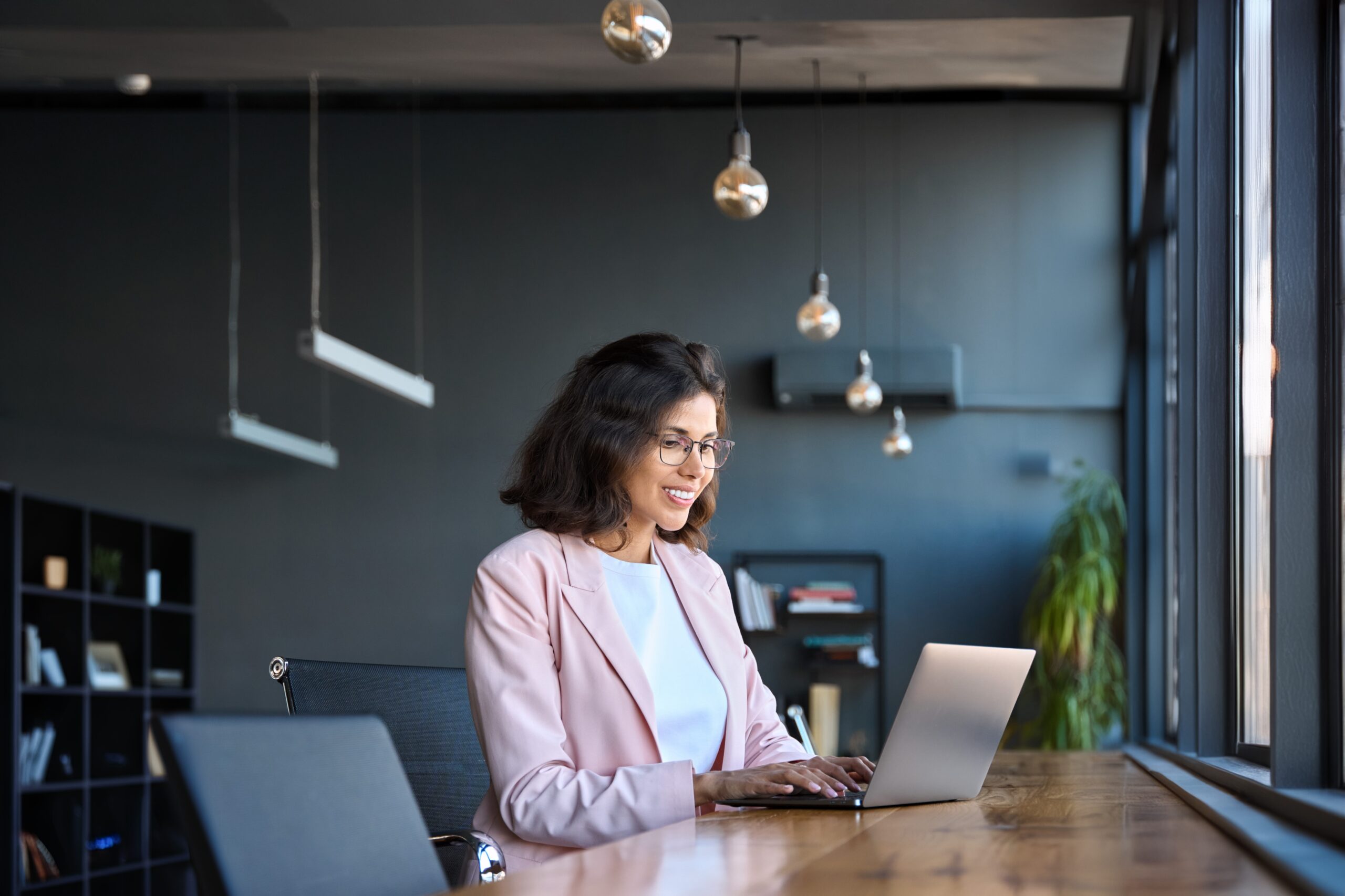 Happy,Latin,Hispanic,Young,Business,Woman,Working,On,Laptop,Computer Happy,Latin,Hispanic,Young,Business,Woman,Working,On,Laptop,Computer